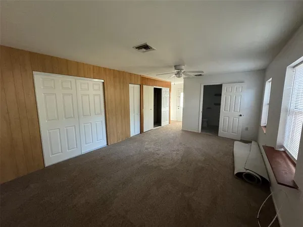 a view of a livingroom with a staircase