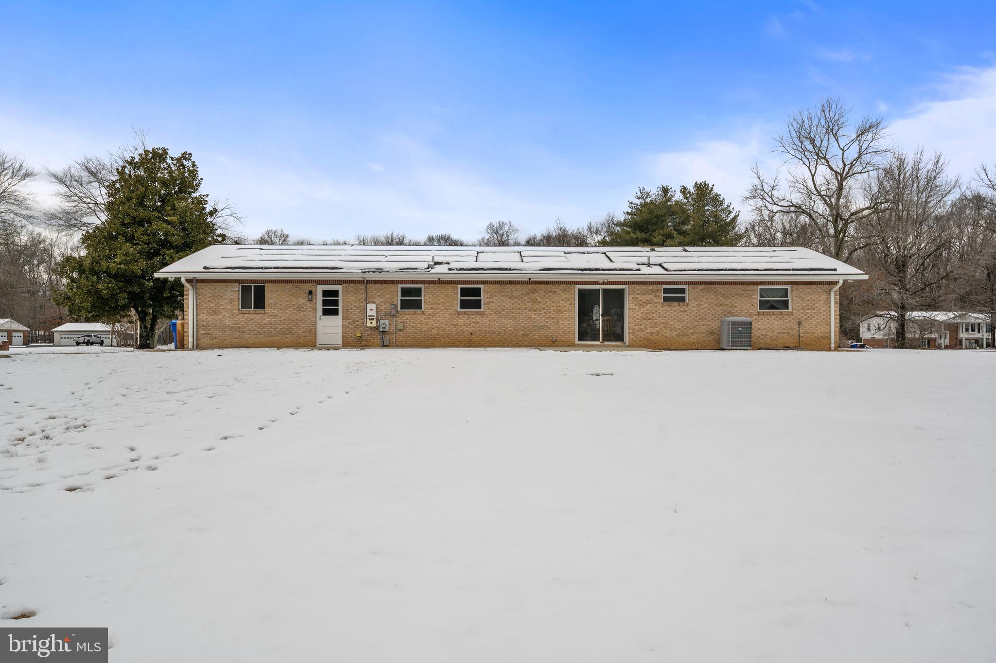 4030 Ravine Drive White Plains, MD 20695 - Photo 16 of 64 a view of house with large trees and outdoor space