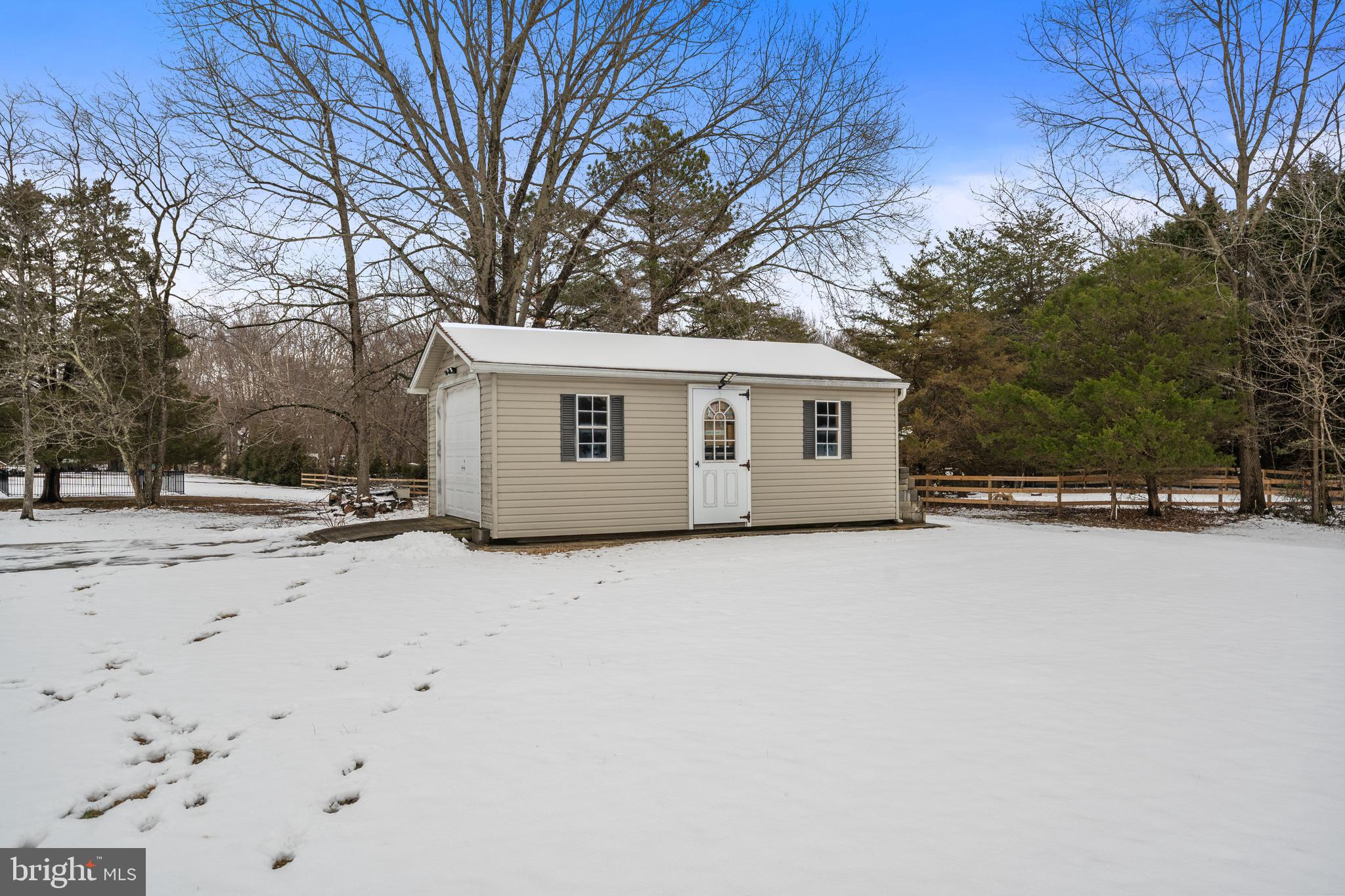 4030 Ravine Drive White Plains, MD 20695 - Photo 18 of 64 a view of a house with snow on the yard
