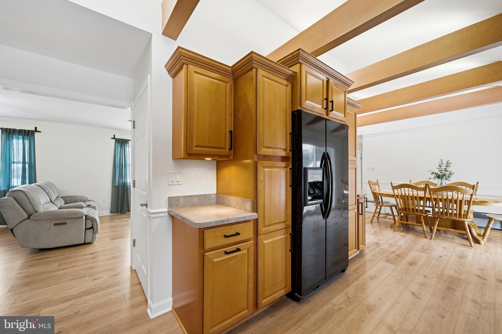4030 Ravine Drive White Plains, MD 20695 - Photo 26 of 64 a hallway with furniture and wooden floor