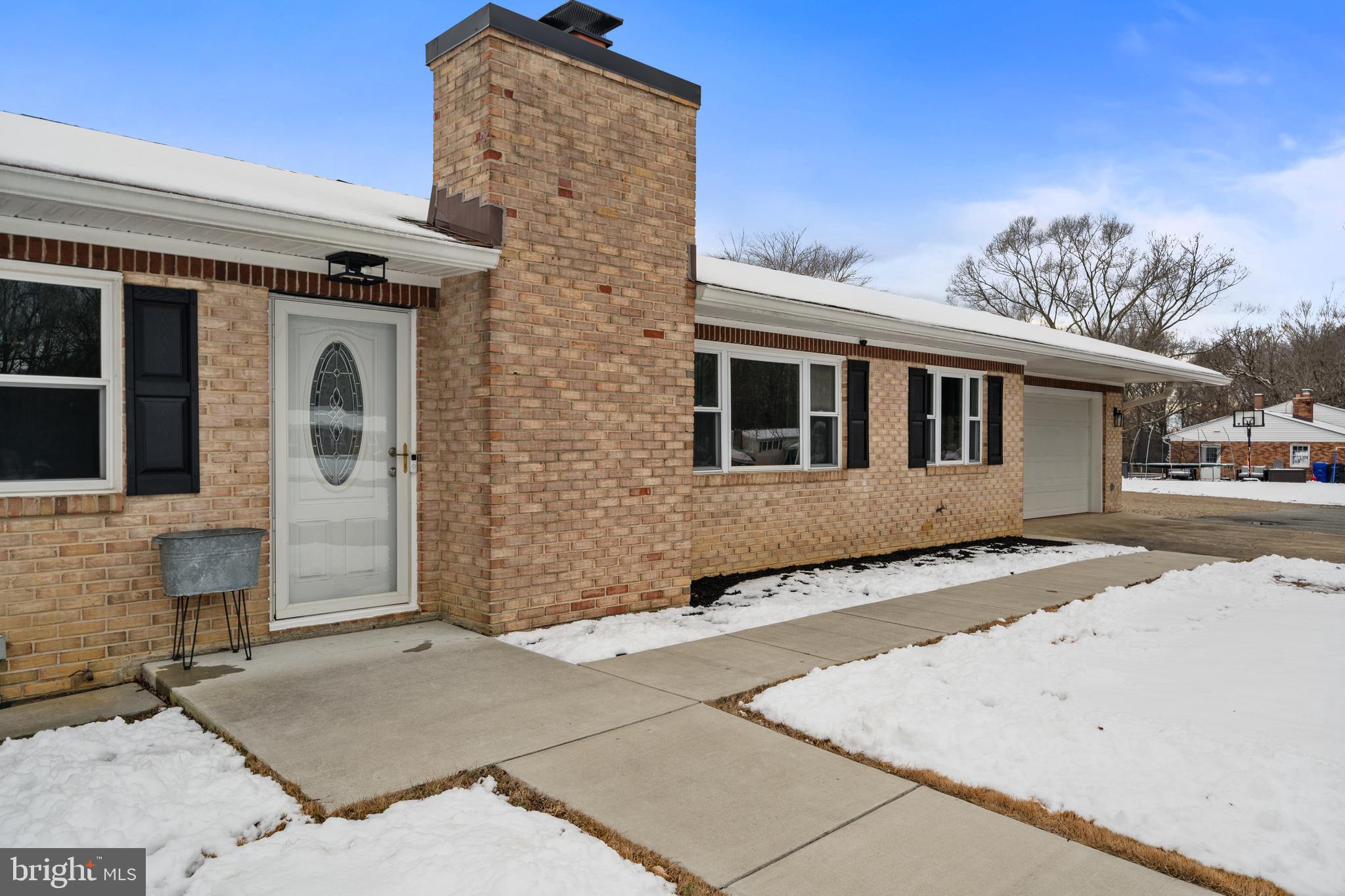 4030 Ravine Drive White Plains, MD 20695 - Photo 4 of 64 a front view of a house