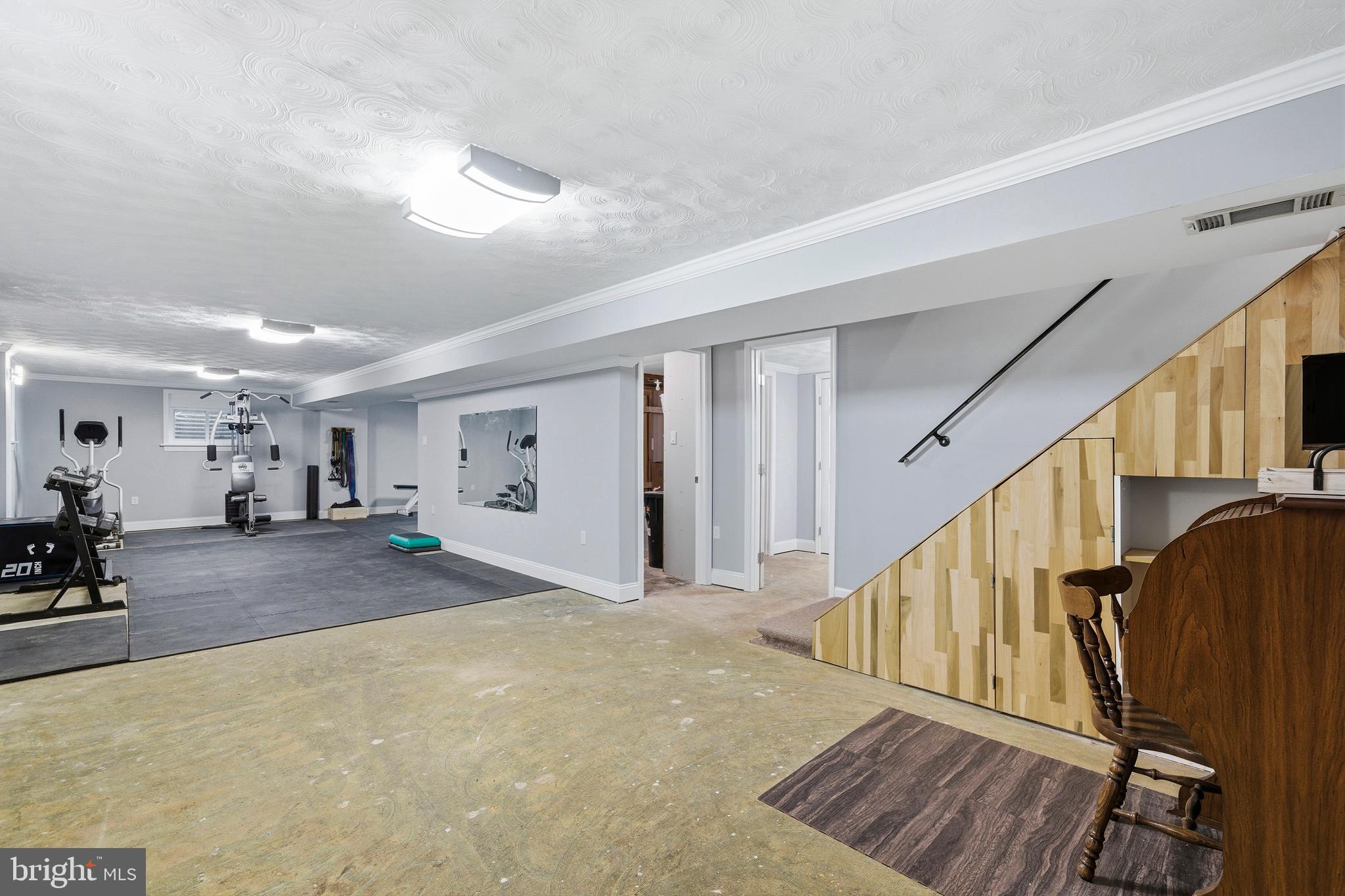 4030 Ravine Drive White Plains, MD 20695 - Photo 42 of 64 a view of a hallway with staircase