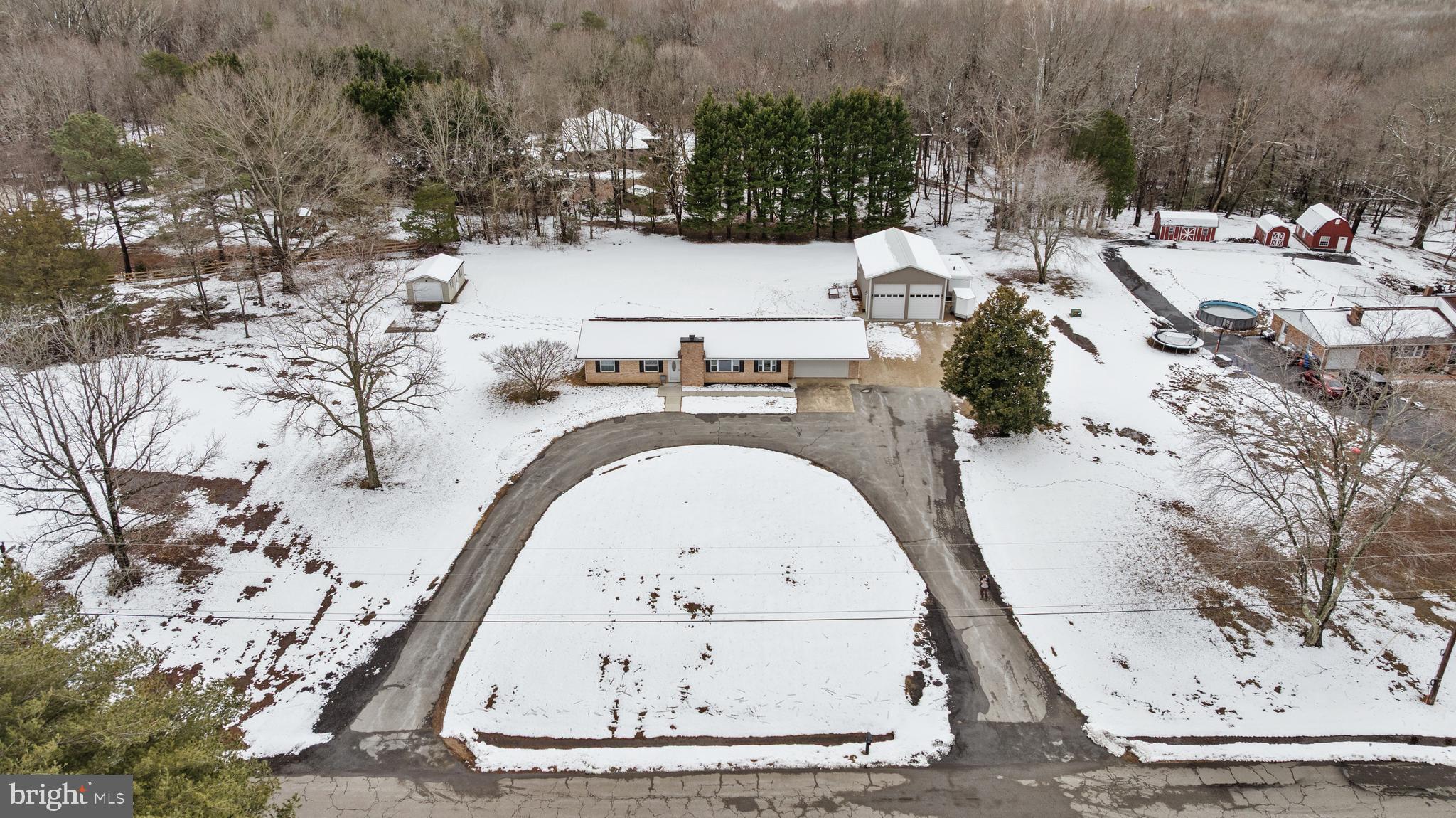 4030 Ravine Drive White Plains, MD 20695 - Photo 51 of 64 a view of swimming pool with outdoor seating