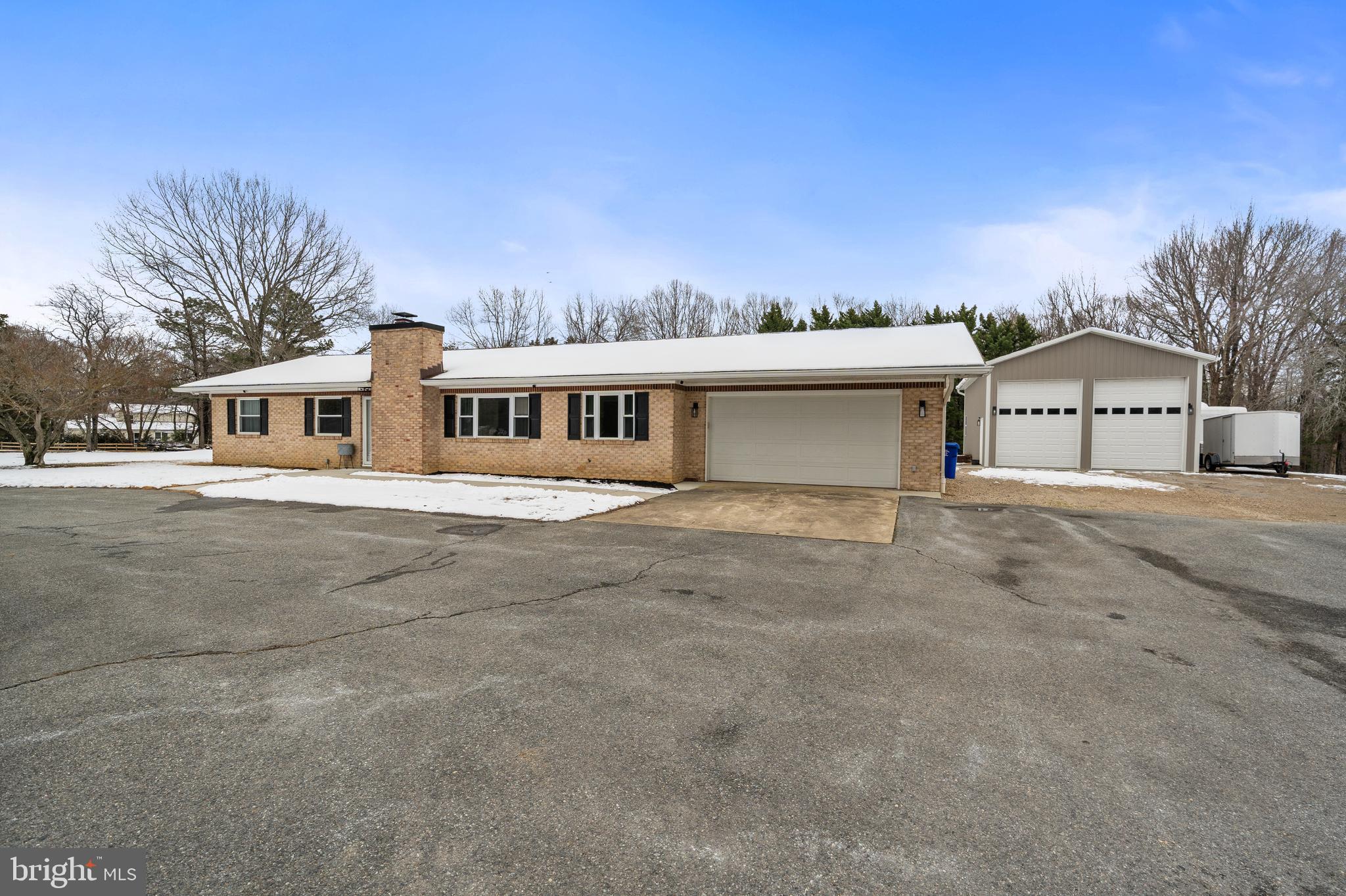 4030 Ravine Drive White Plains, MD 20695 - Photo 58 of 64 a view of a big house with a big yard and large trees