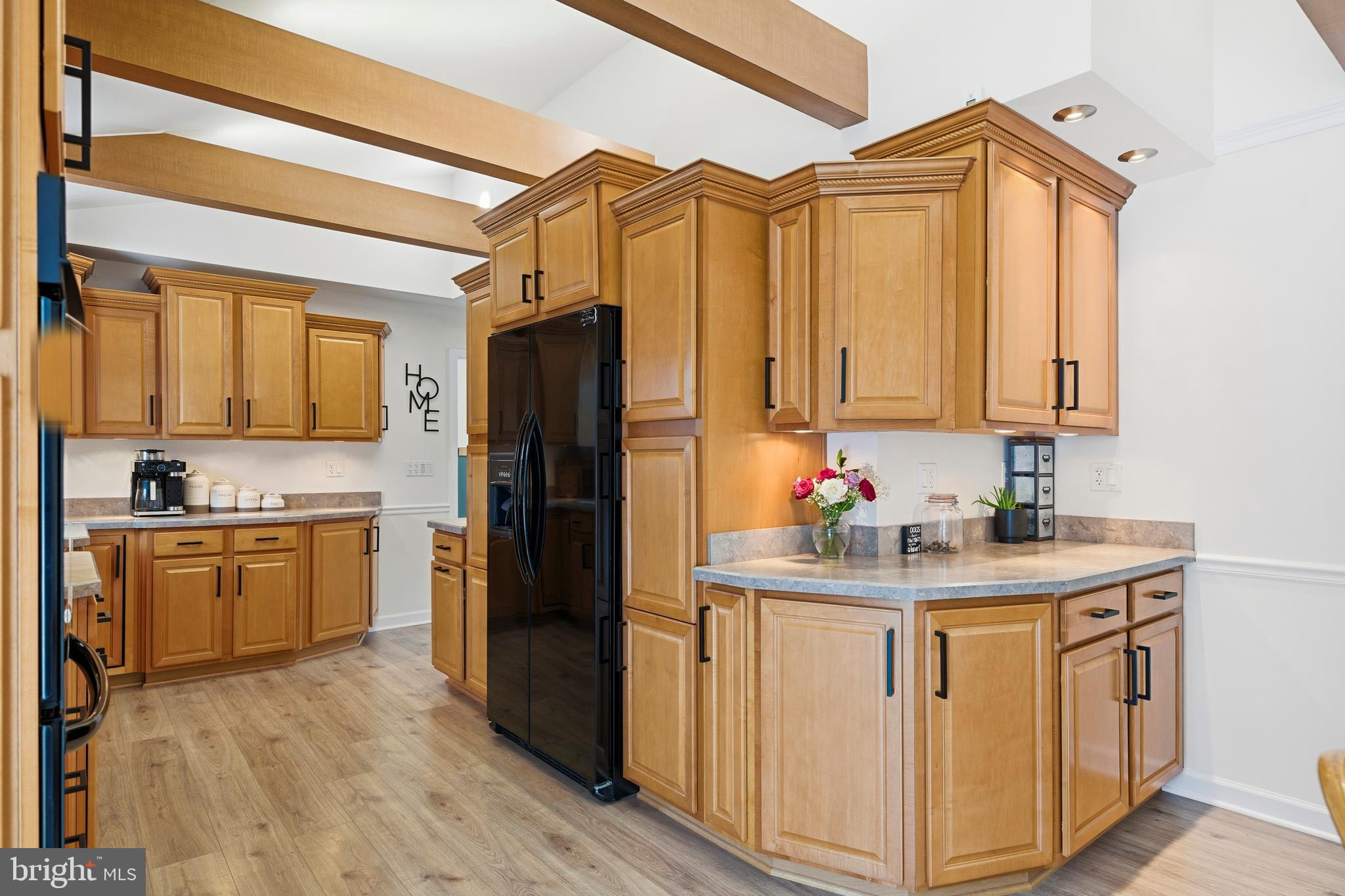 4030 Ravine Drive White Plains, MD 20695 - Photo 8 of 64 a kitchen with stainless steel appliances granite countertop a sink stove and refrigerator