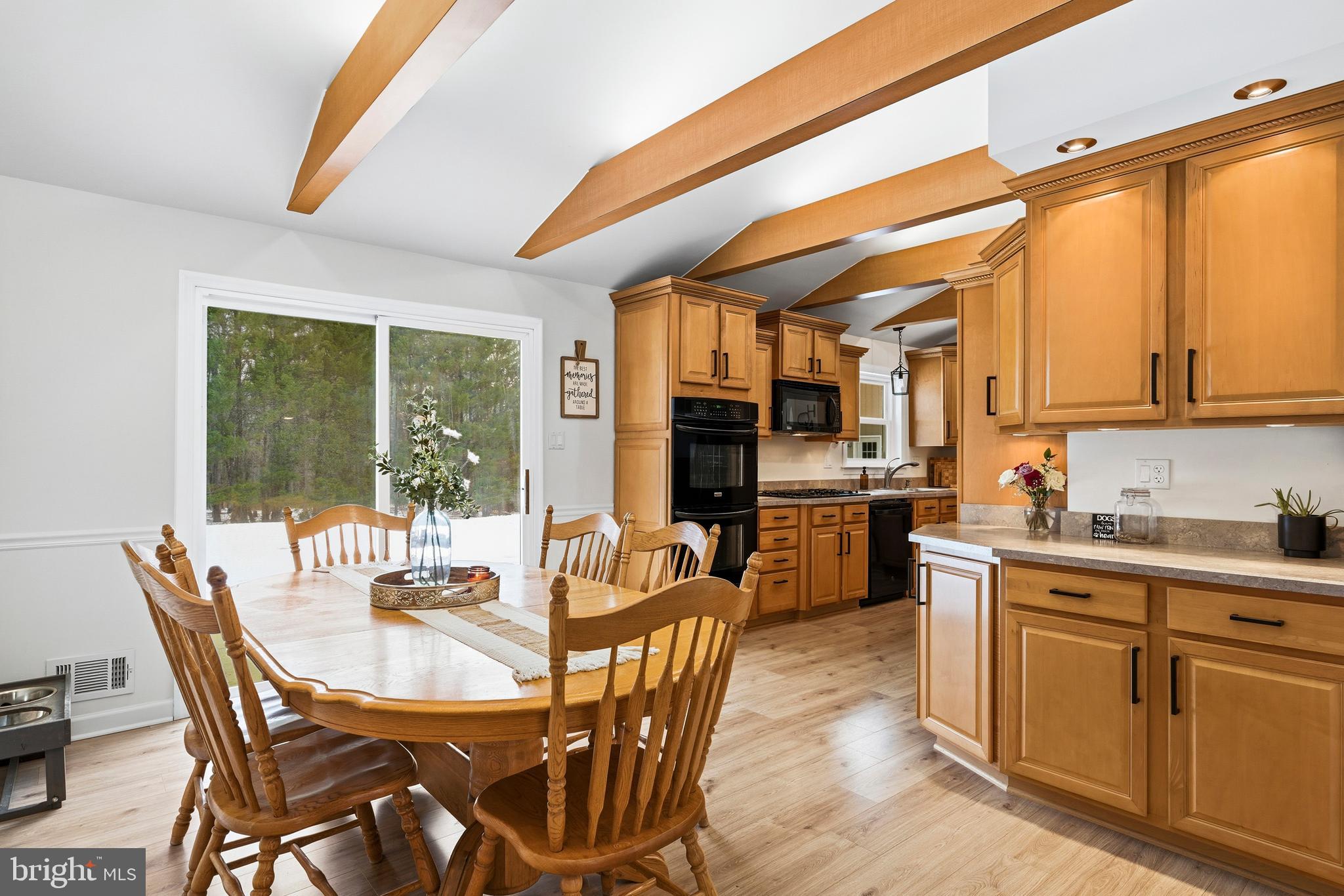 4030 Ravine Drive White Plains, MD 20695 - Photo 9 of 64 a view of a dining room with furniture and wooden floor