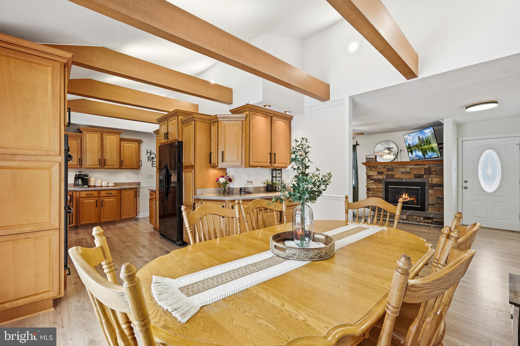 4030 Ravine Drive White Plains, MD 20695 - Photo 10 of 64 a living room with fireplace furniture and a flat screen tv