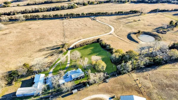 a view of a swimming pool and an outdoor space