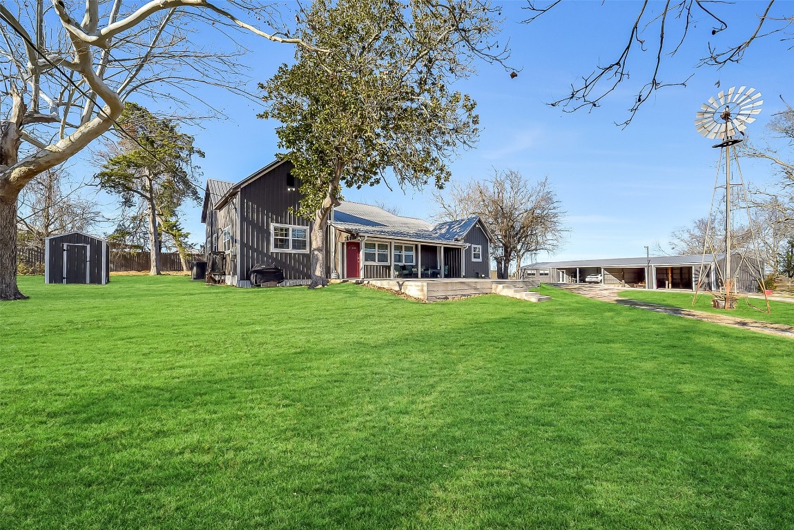 1005 Church Street Brenham, TX 77833 - Photo 2 of 44 a front view of house with yard