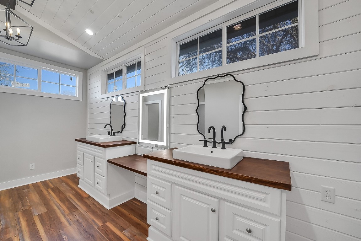 1005 Church Street Brenham, TX 77833 - Photo 21 of 44 a kitchen with a sink and cabinets