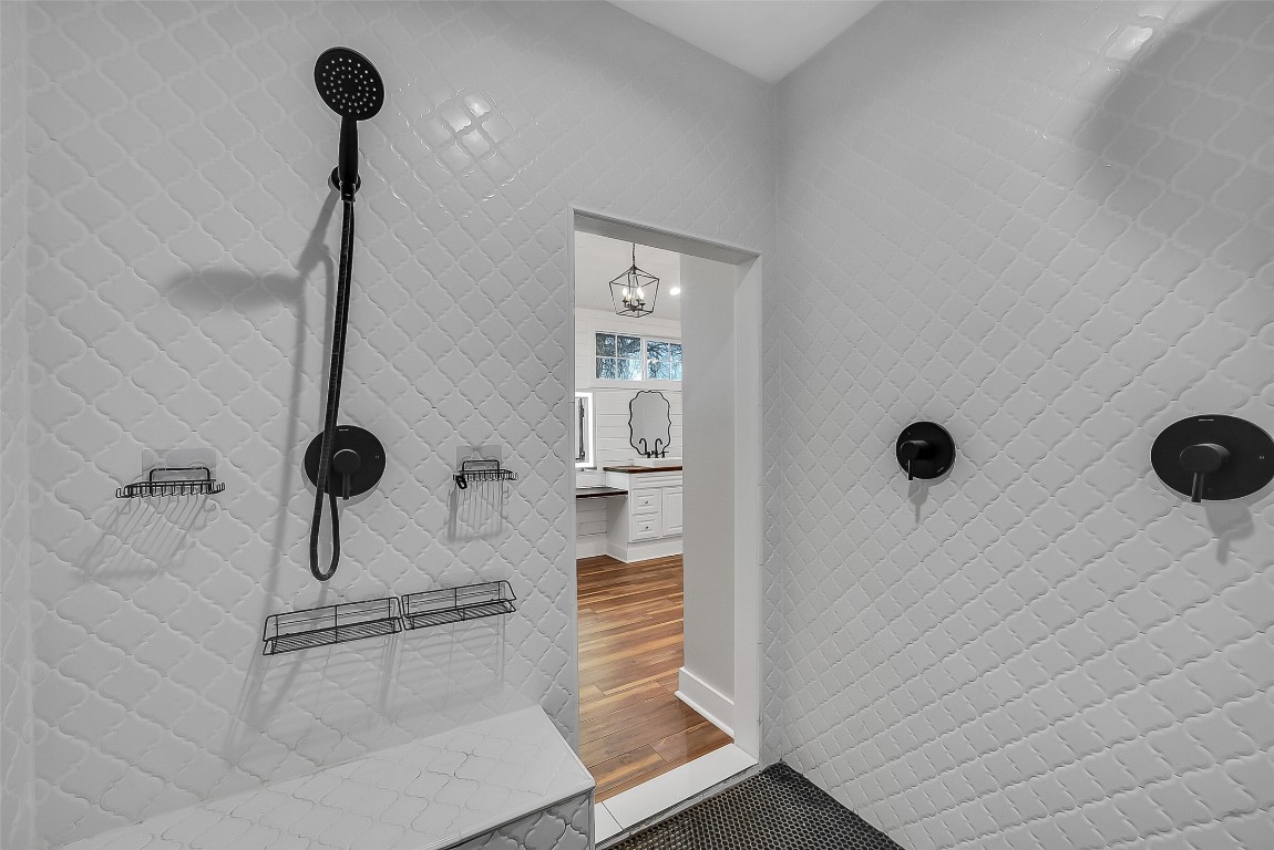 1005 Church Street Brenham, TX 77833 - Photo 23 of 44 a bathroom with a shower