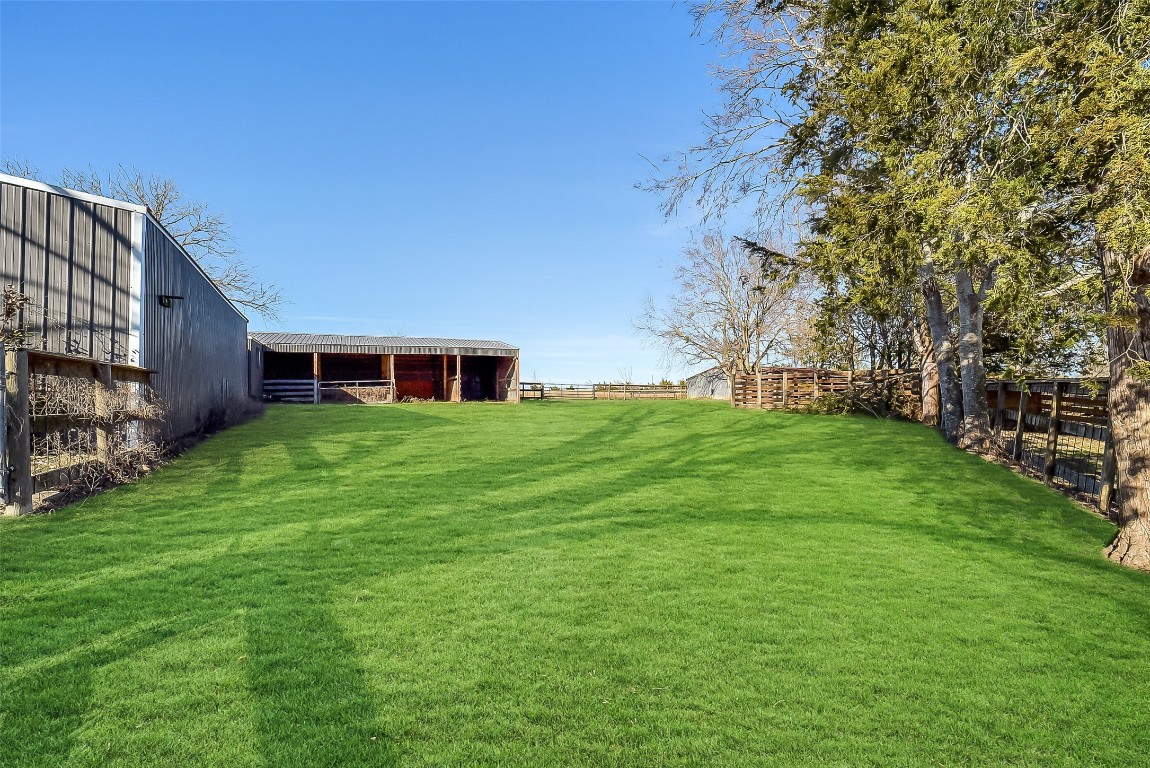 1005 Church Street Brenham, TX 77833 - Photo 32 of 44 a view of house with backyard