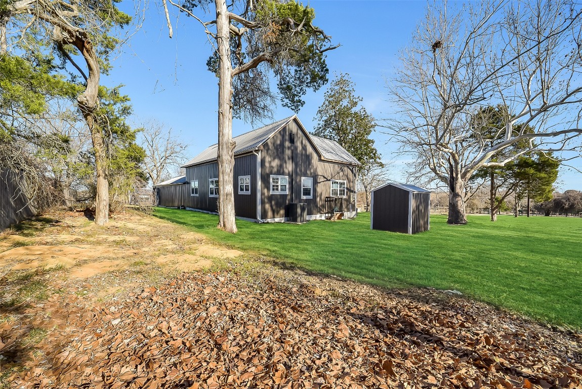 1005 Church Street Brenham, TX 77833 - Photo 7 of 44 a front view of house with a garden