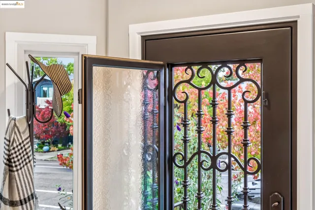 a living room with fireplace furniture and a wooden floor