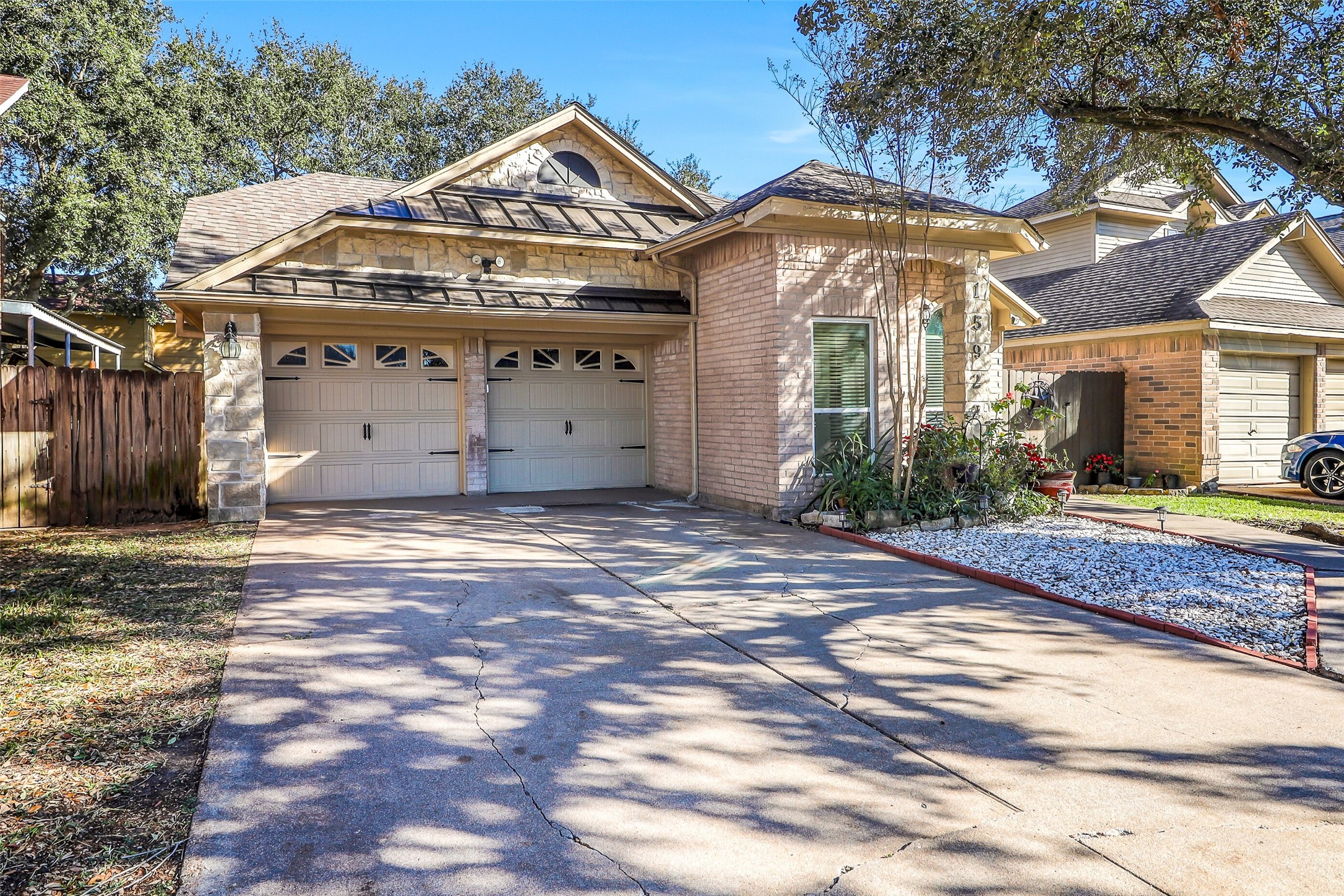15922 Riverside Grove Drive Houston, TX 77083 - Photo 23 of 23 a front view of a house with a yard