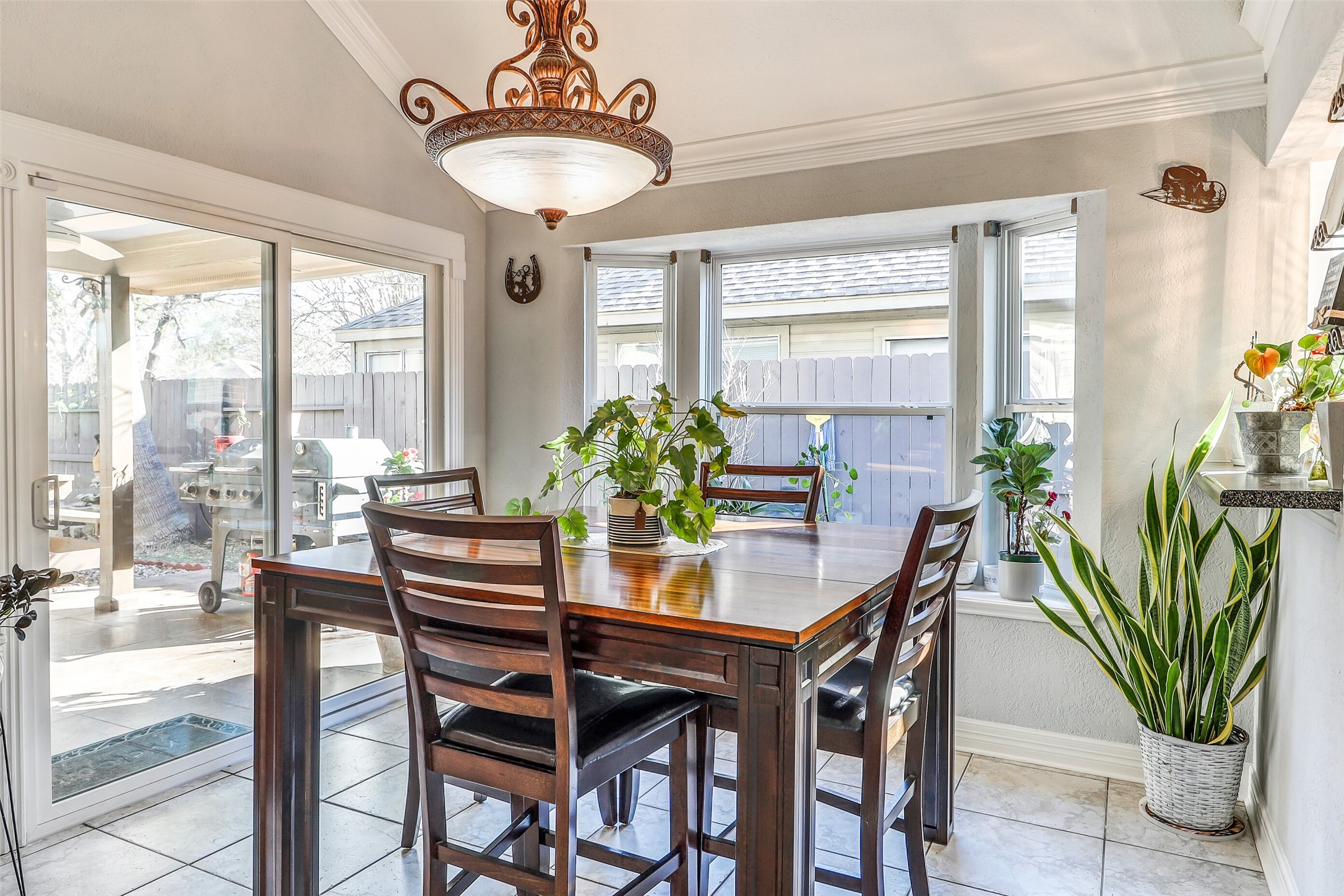 15922 Riverside Grove Drive Houston, TX 77083 - Photo 9 of 23 a view of a dining room with furniture window and outside view
