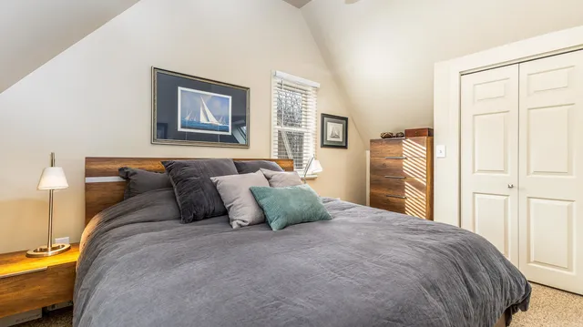 a bed room with a bed and a couch