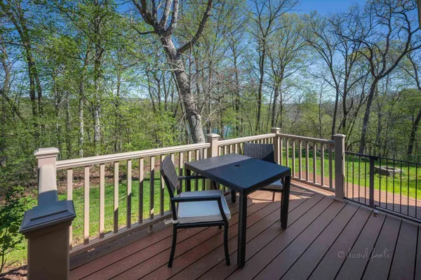 a view of a wooden roof deck