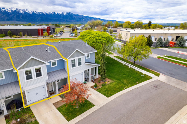 2382 South 1275th Street West Logan, UT 84321 - Photo 31 of 36 Aerial view of property and surrounding area featuring a mountain backdrop and property boundaries highlighted