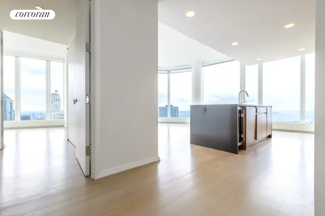 a kitchen with stainless steel appliances a refrigerator and a stove