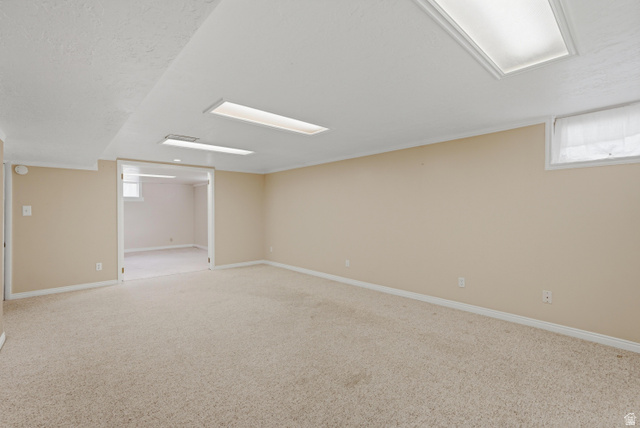 378 West 200 South Bountiful, UT 84010 - Photo 19 of 32 Expansive carpeted room with neutral wall tones and white trim