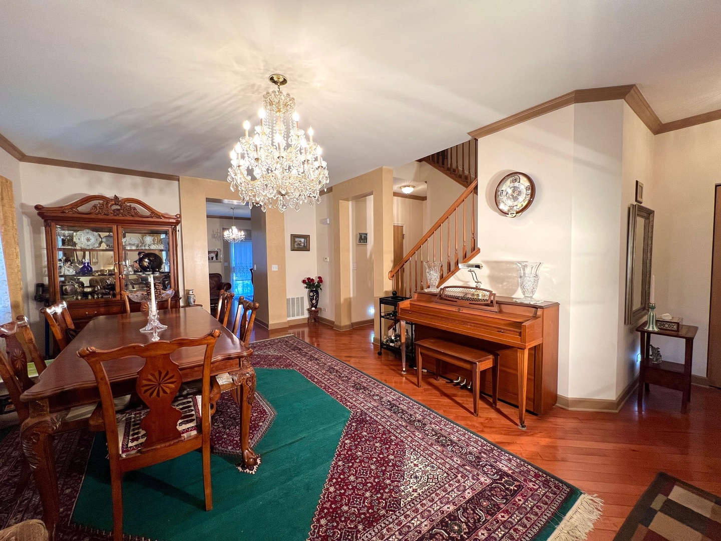 752 South Parkside Drive Round Lake, IL 60073 - Photo 9 of 38 a living room with furniture and a chandelier