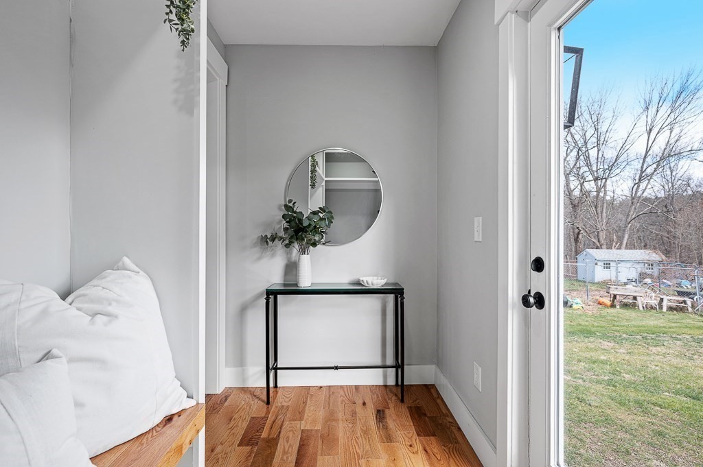 108 Paxton Road Spencer, MA 01562 - Photo 5 of 26 a front view of a house with a yard