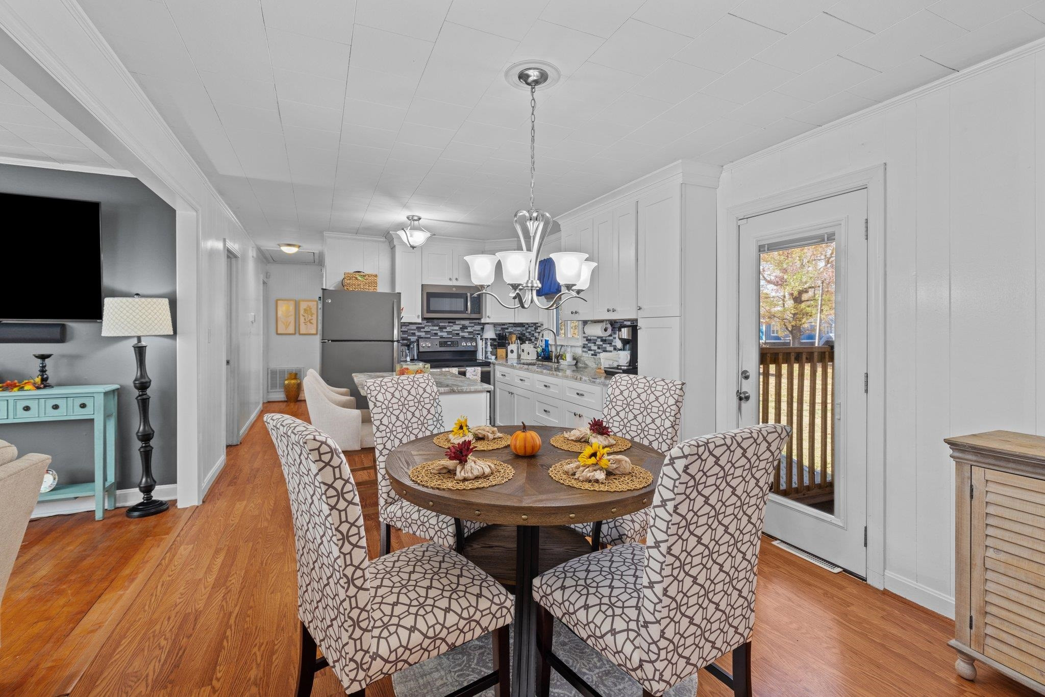 761 Jones Lester Road Roxboro, NC 27574 - Photo 18 of 27 a view of a dining room with furniture window and wooden floor