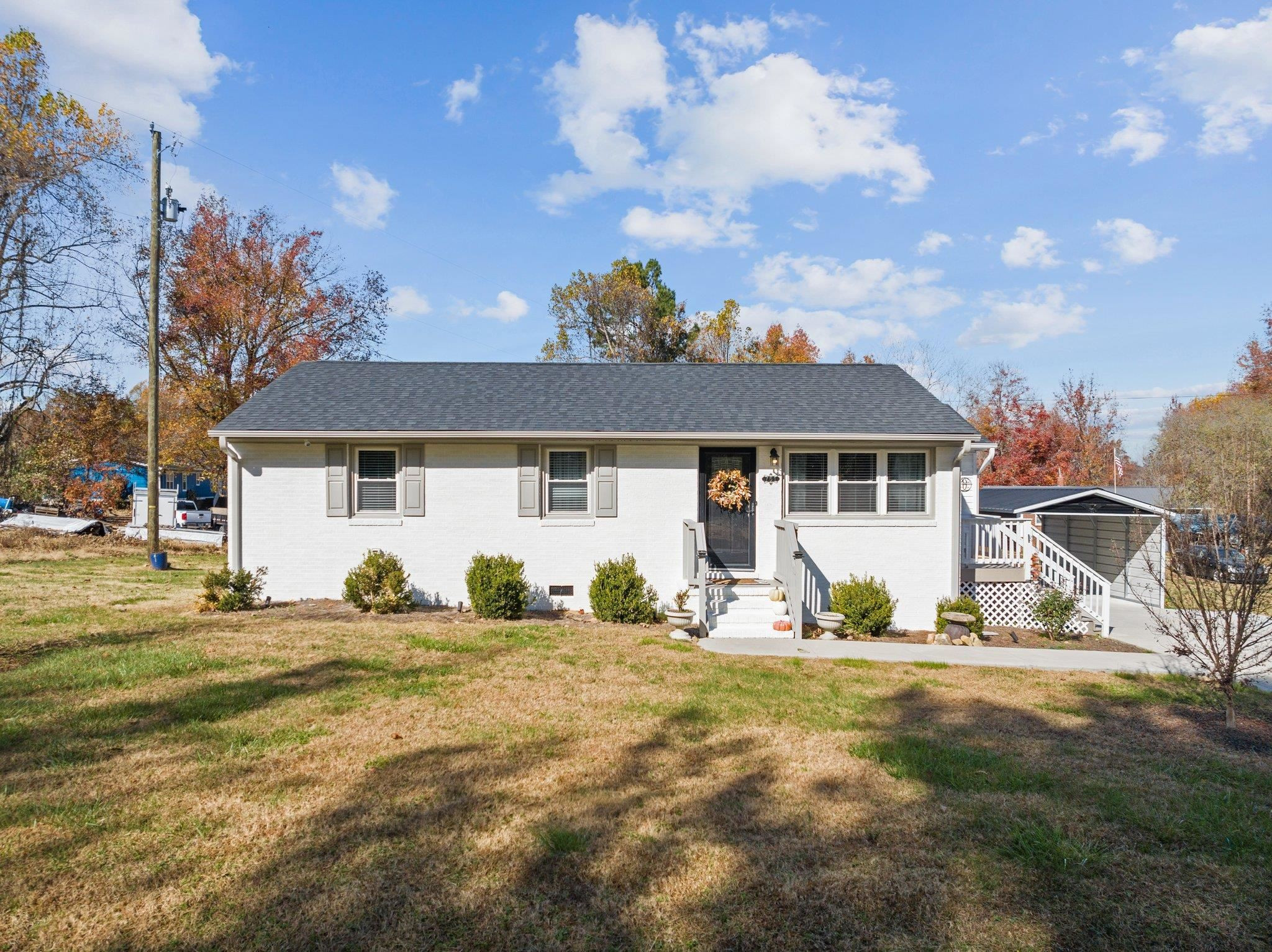 761 Jones Lester Road Roxboro, NC 27574 - Photo 2 of 27 a front view of a house with a yard