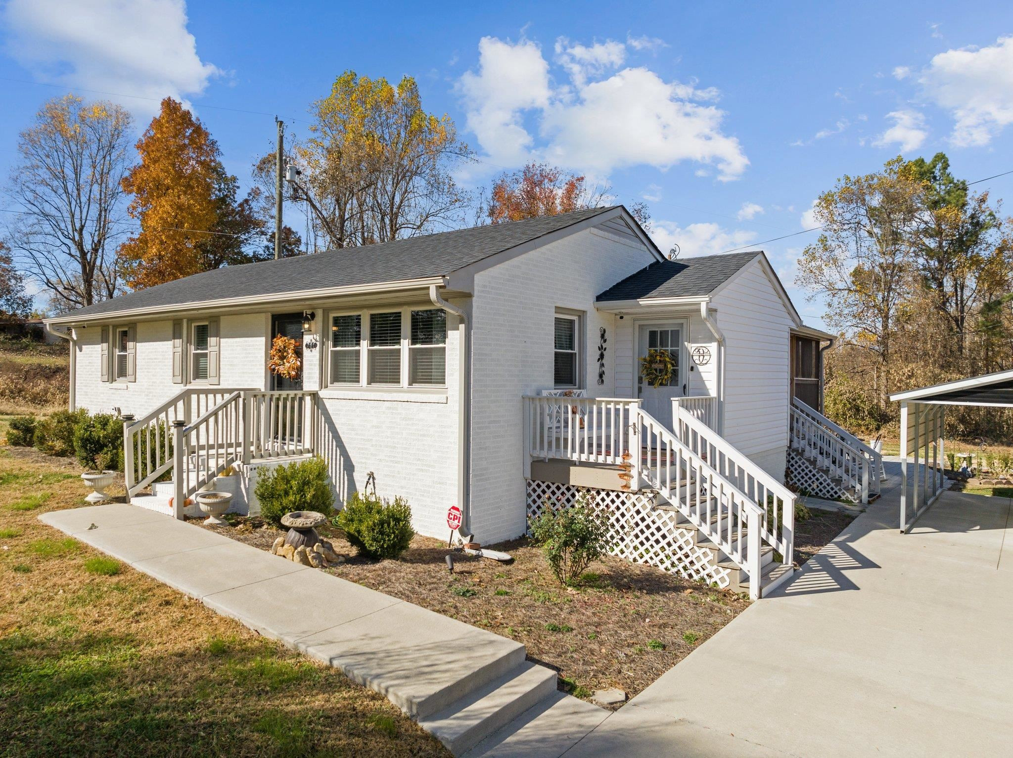 761 Jones Lester Road Roxboro, NC 27574 - Photo 4 of 27 a front view of a house with garden