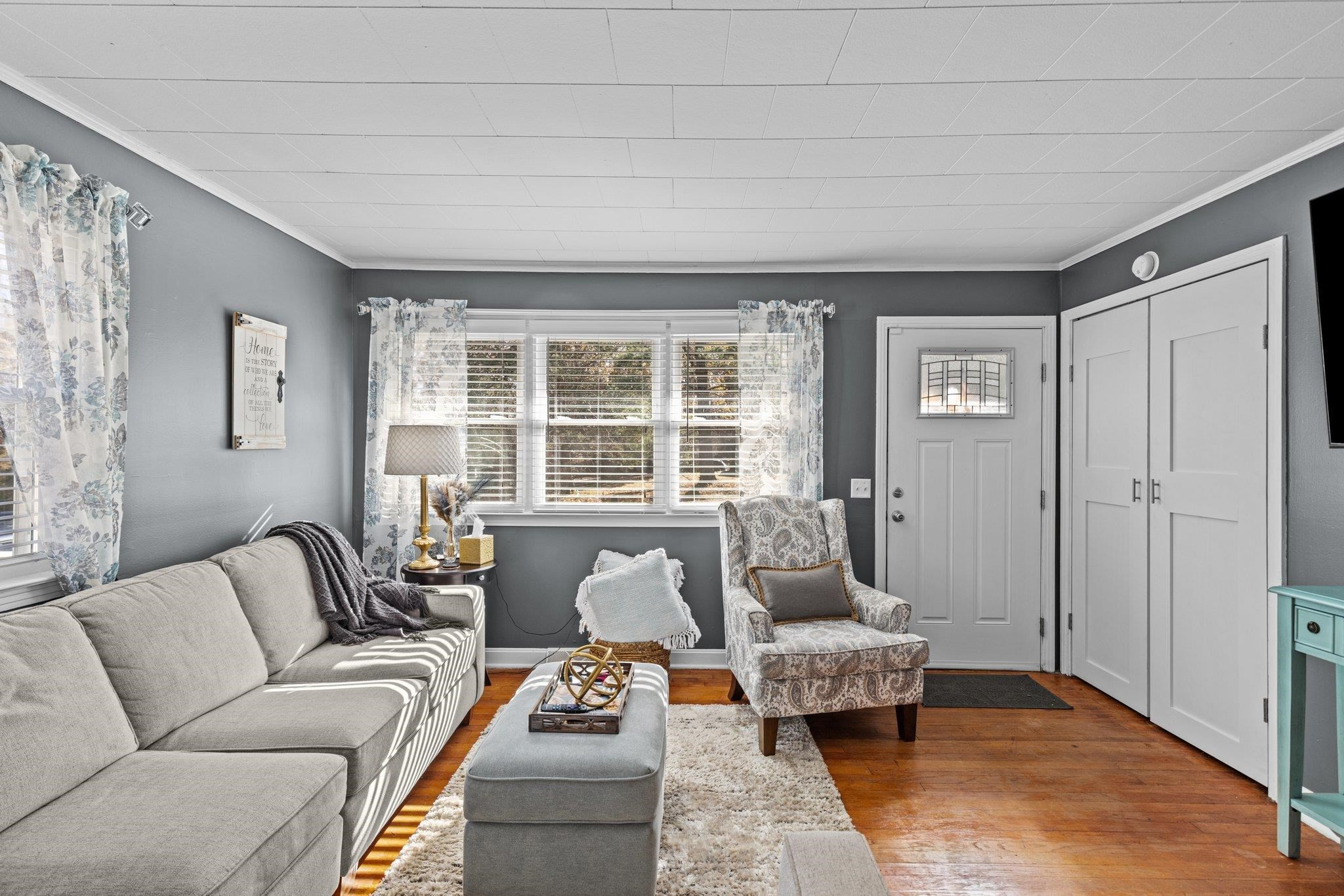 761 Jones Lester Road Roxboro, NC 27574 - Photo 5 of 27 a living room with furniture and a large window