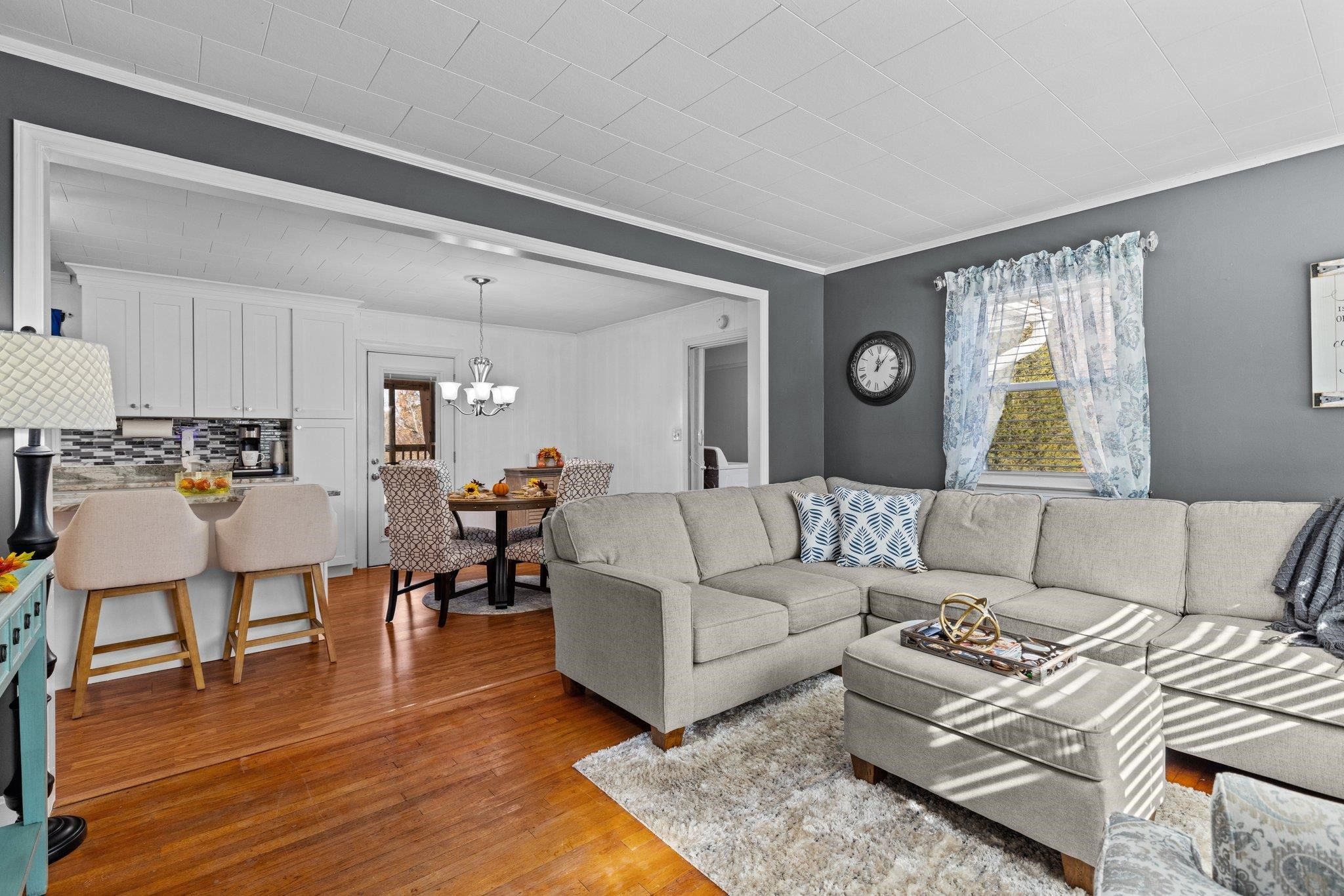 761 Jones Lester Road Roxboro, NC 27574 - Photo 9 of 27 a living room with furniture and wooden floor