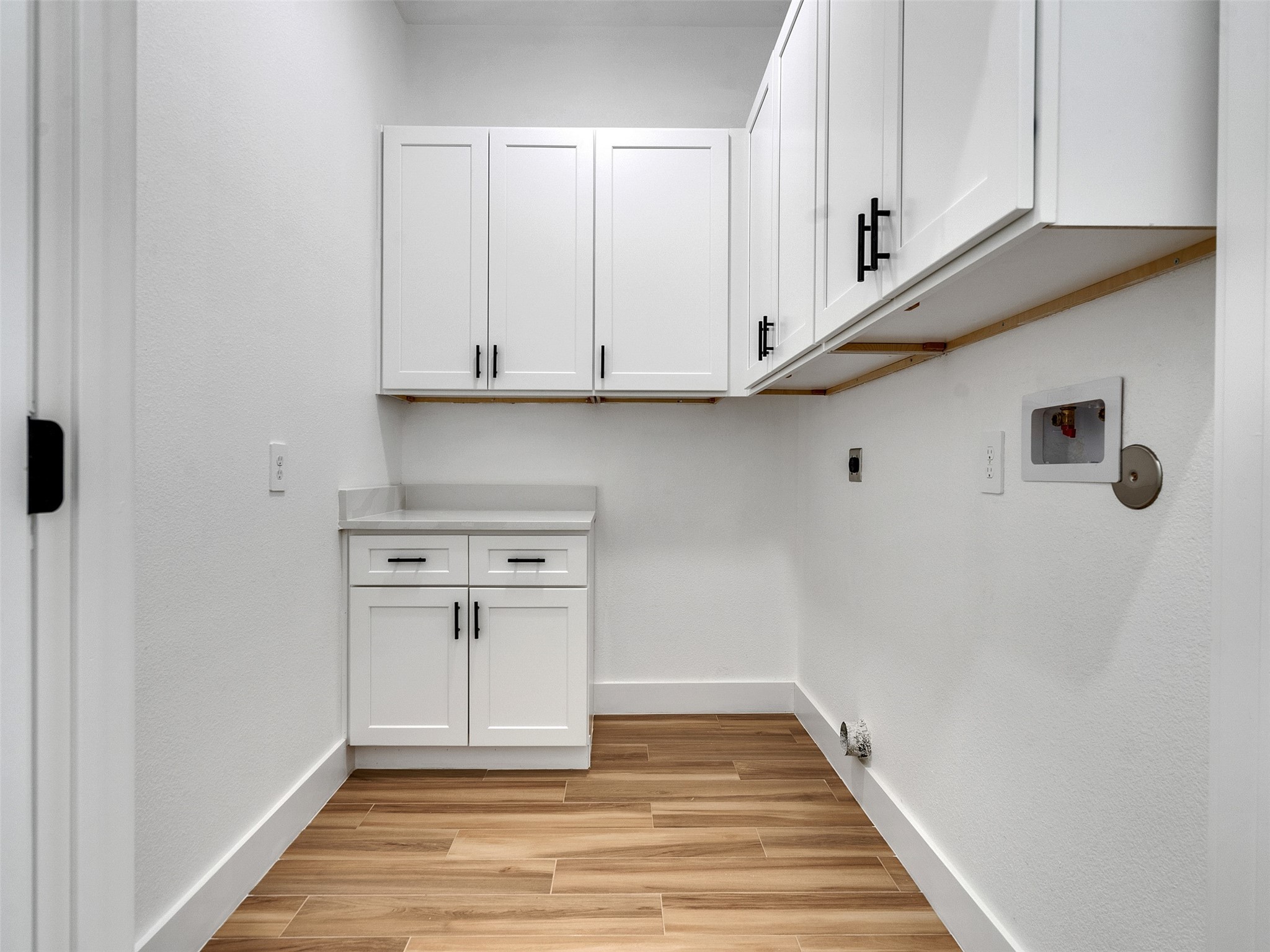 4421 Reed Road, Unit A AND B Houston, TX 77051 - Photo 12 of 39 a view of a kitchen with white cabinets