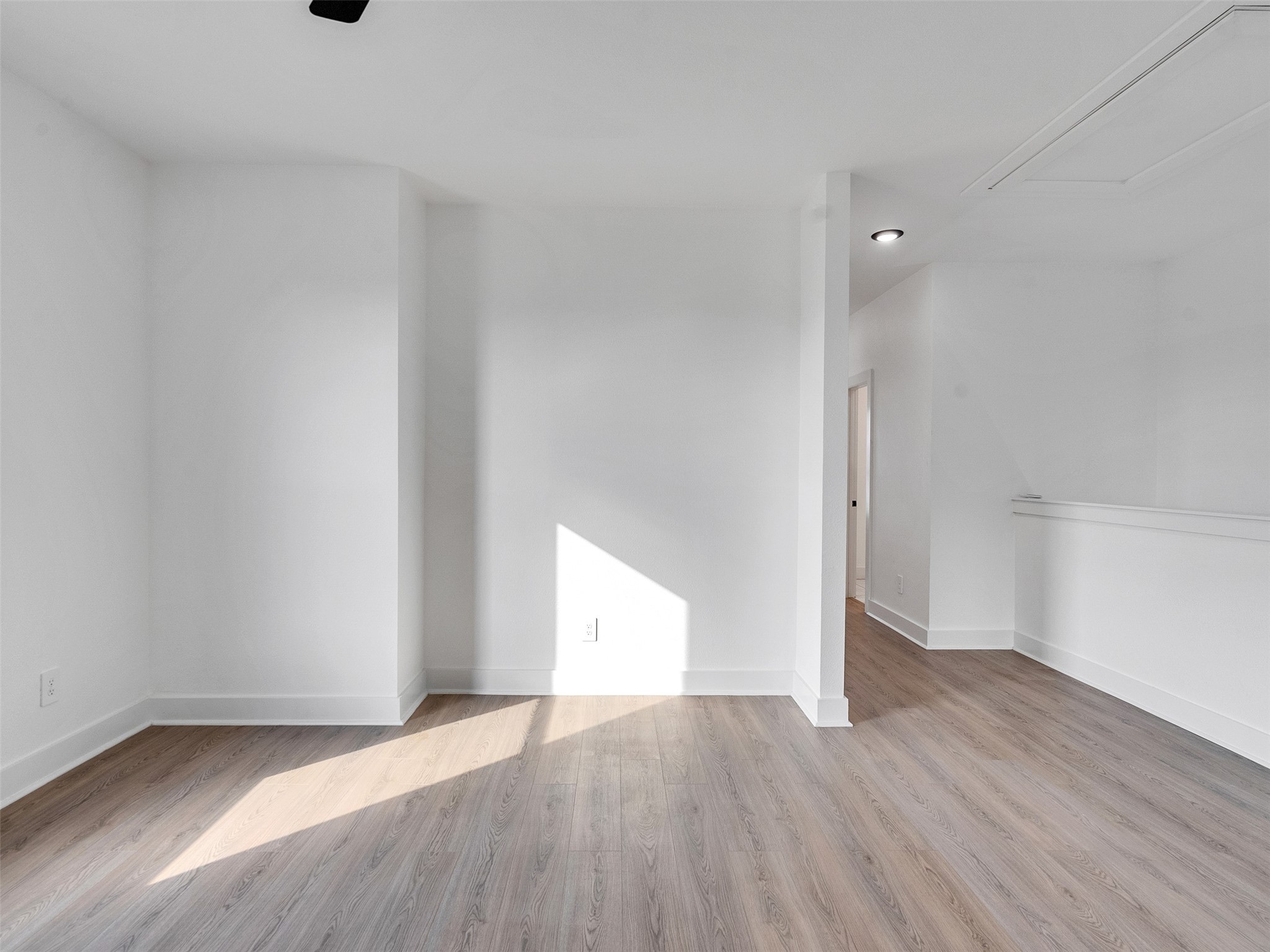 4421 Reed Road, Unit A AND B Houston, TX 77051 - Photo 17 of 39 an empty room with wooden floor and windows