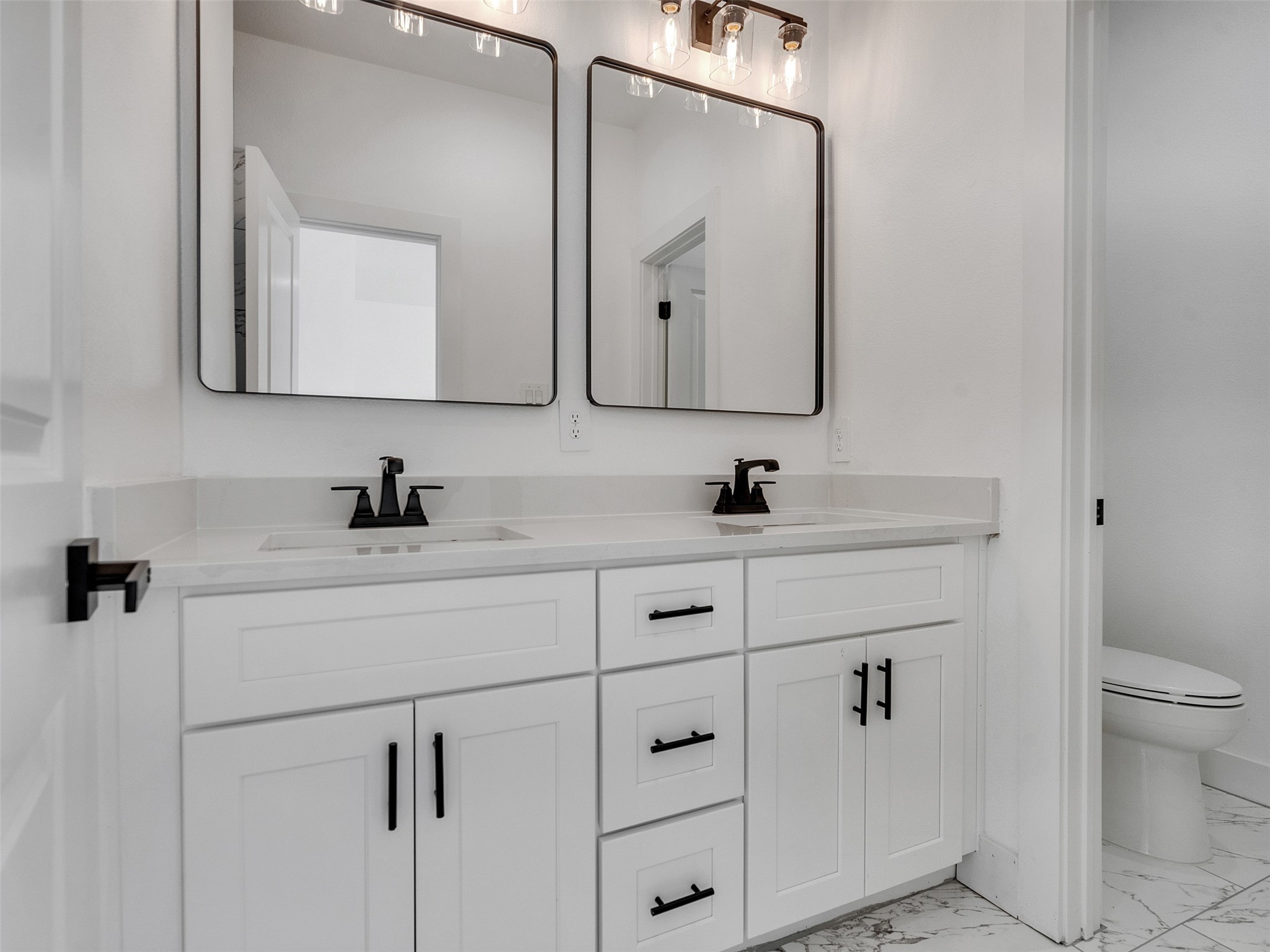 4421 Reed Road, Unit A AND B Houston, TX 77051 - Photo 25 of 39 a bathroom with a double vanity sink mirror and