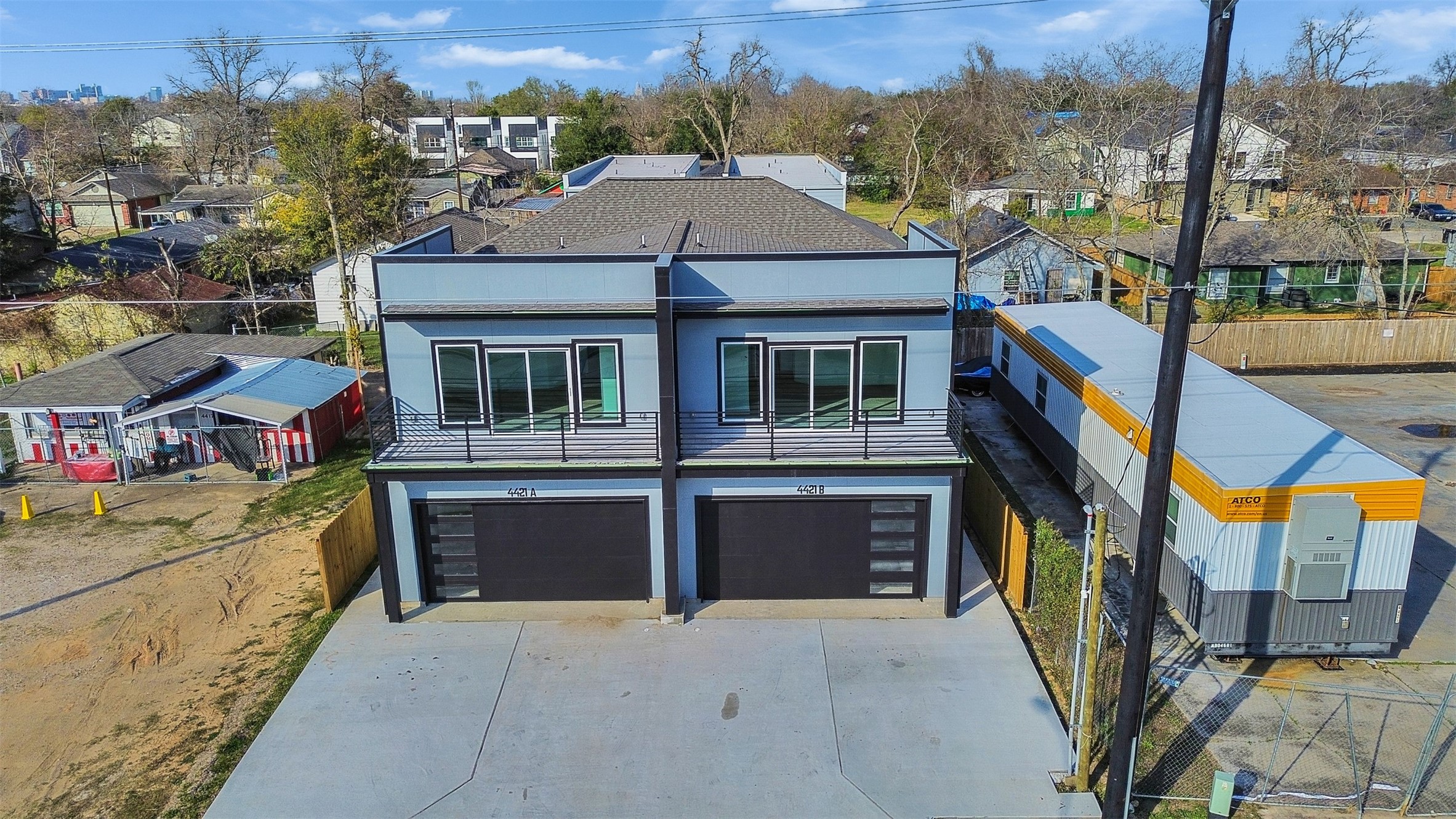 4421 Reed Road, Unit A AND B Houston, TX 77051 - Photo 37 of 39 a front view of a house with a yard