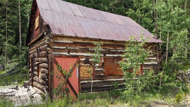 a view of a house with a street
