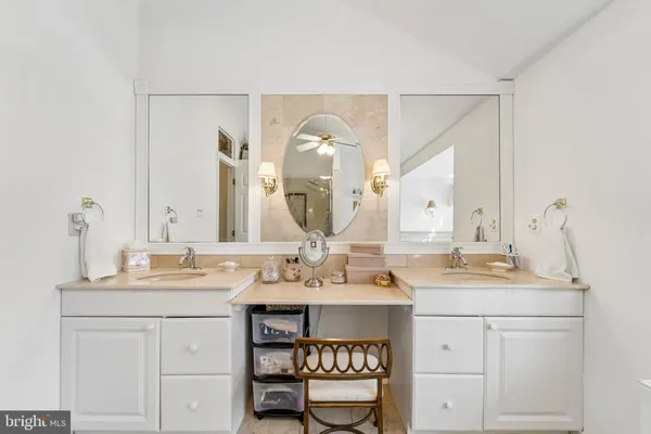 a bathroom with a tub sink toilet and a shower