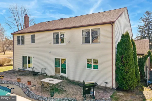a view of a backyard with a garden