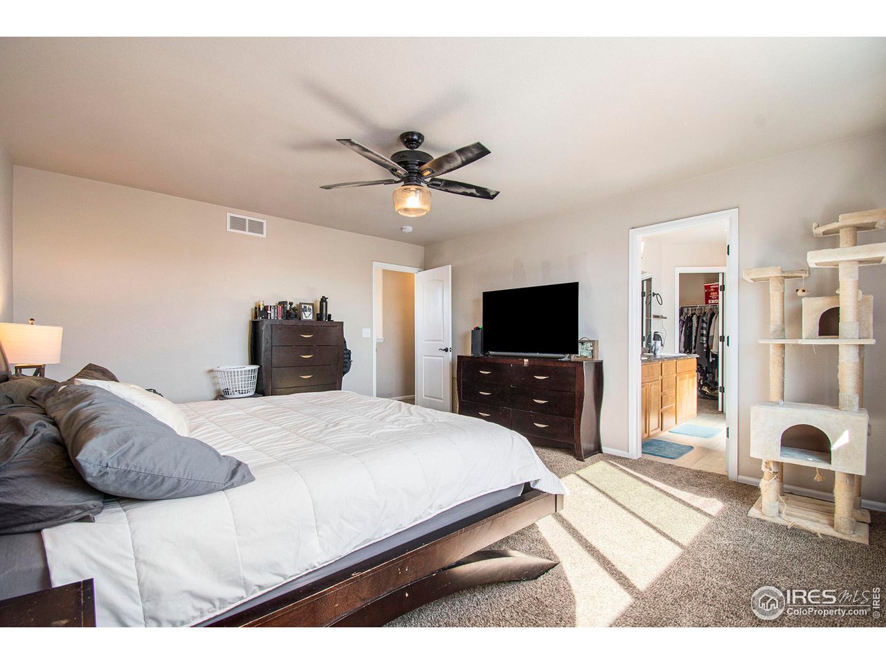 8524 15th St Road Greeley, CO 80634 - Photo 11 of 29 Primary Bedroom with a 5-piece bathroom en suite, upstairs.