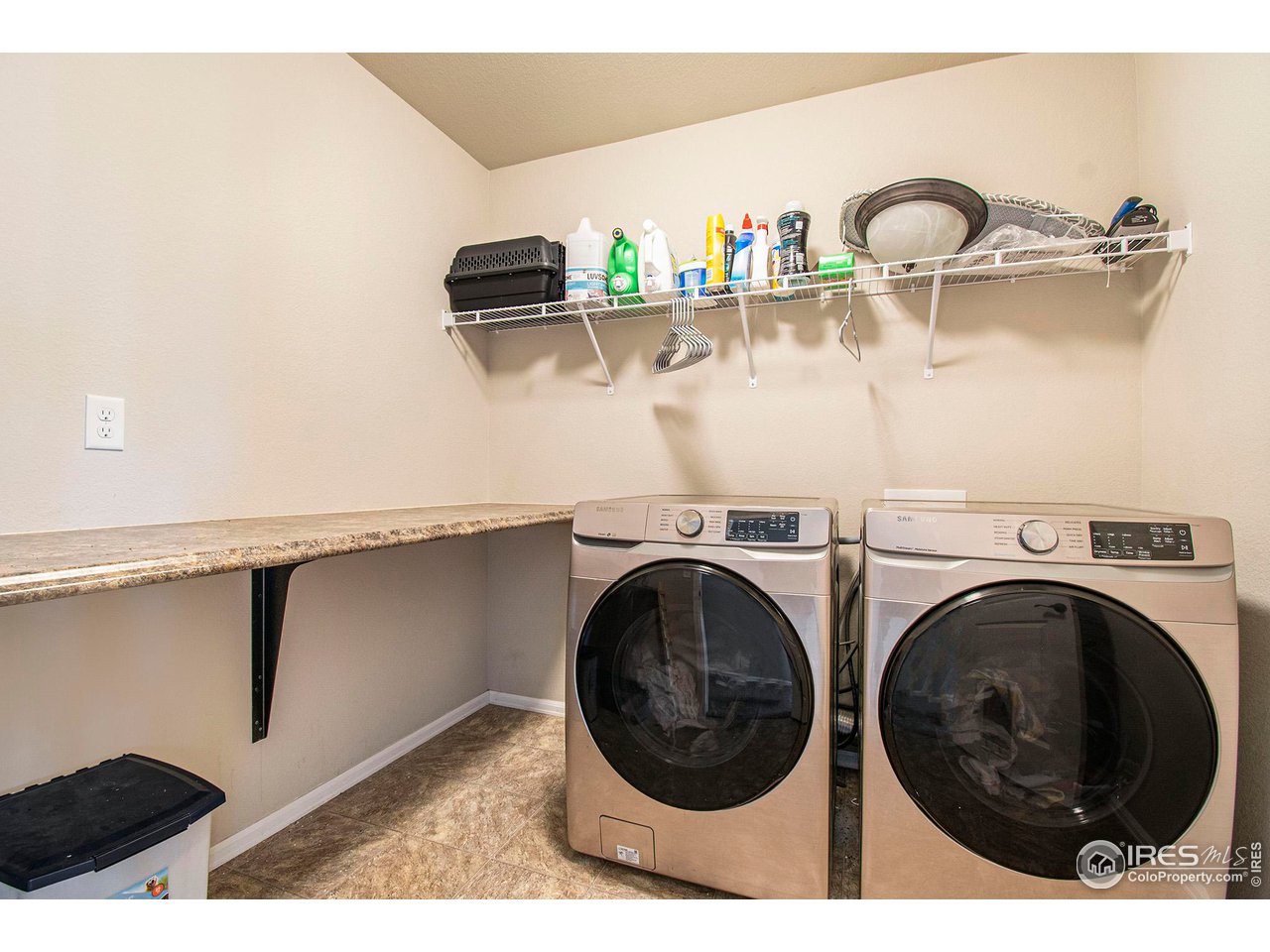 8524 15th St Road Greeley, CO 80634 - Photo 19 of 29 Huge hallway laundry room, upstairs.