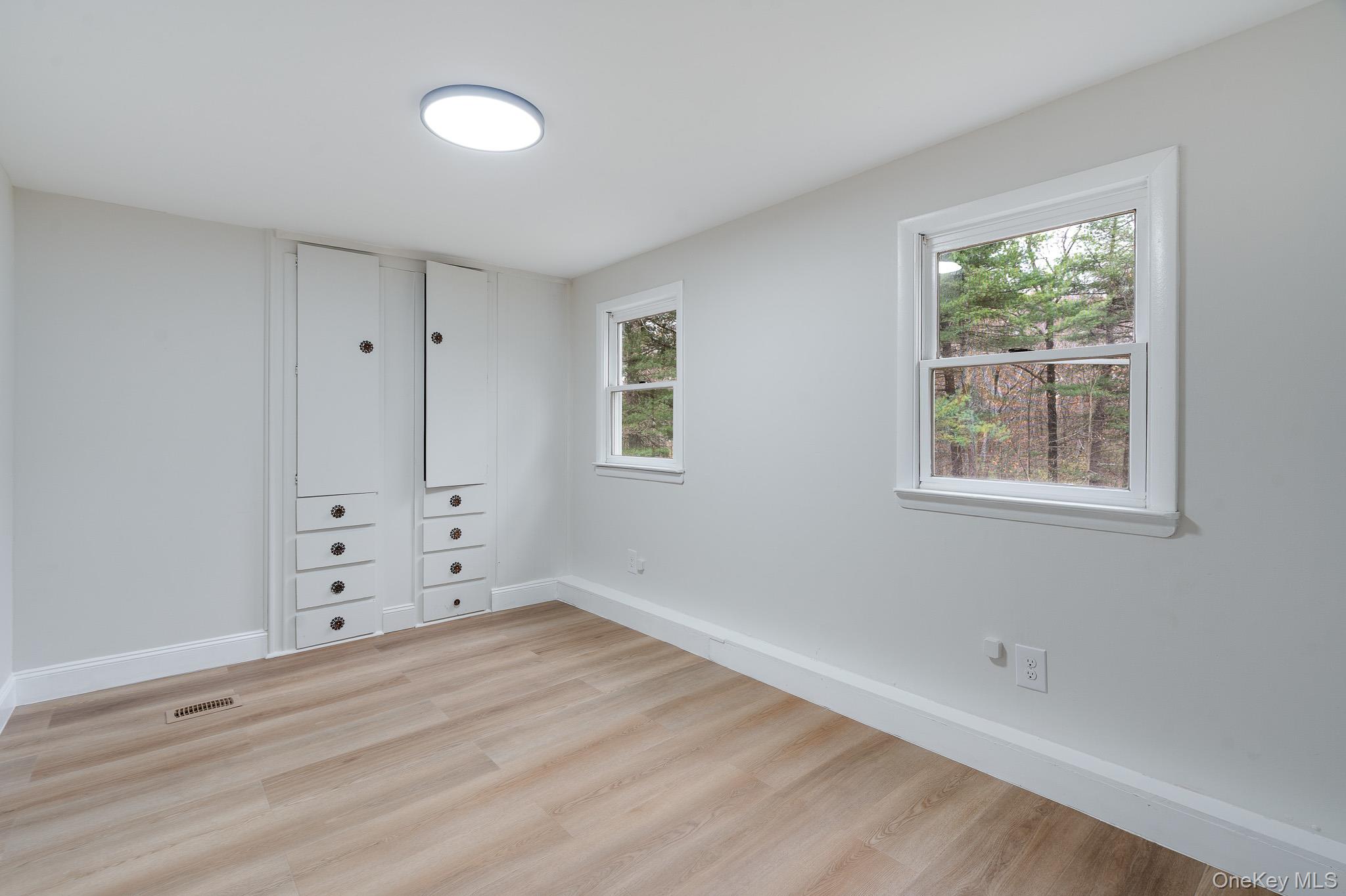 356 Sands Road Middletown, NY 10941 - Photo 15 of 22 a view of empty room with wooden floor and fan