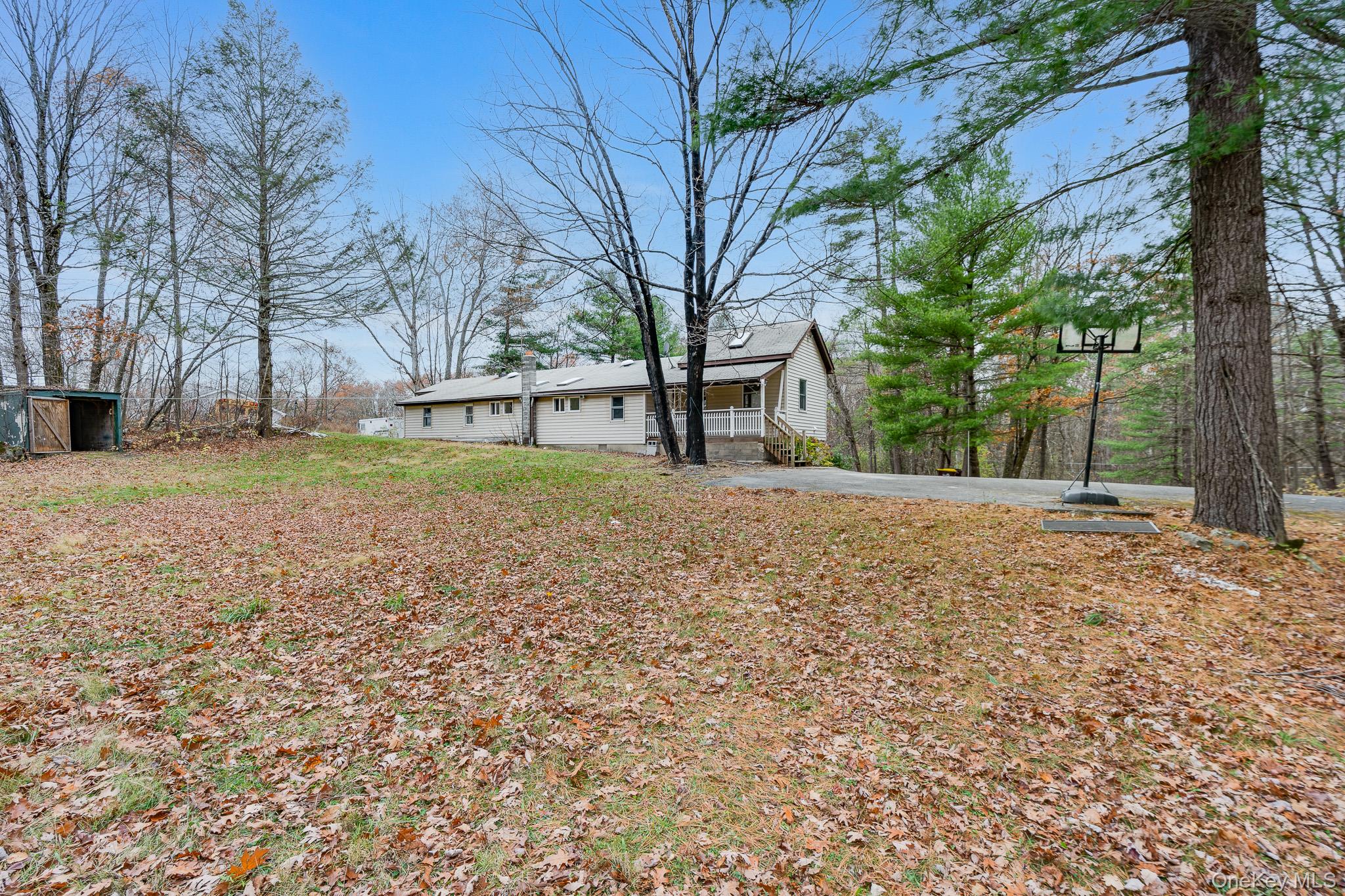 356 Sands Road Middletown, NY 10941 - Photo 21 of 22 a view of a yard with a tree