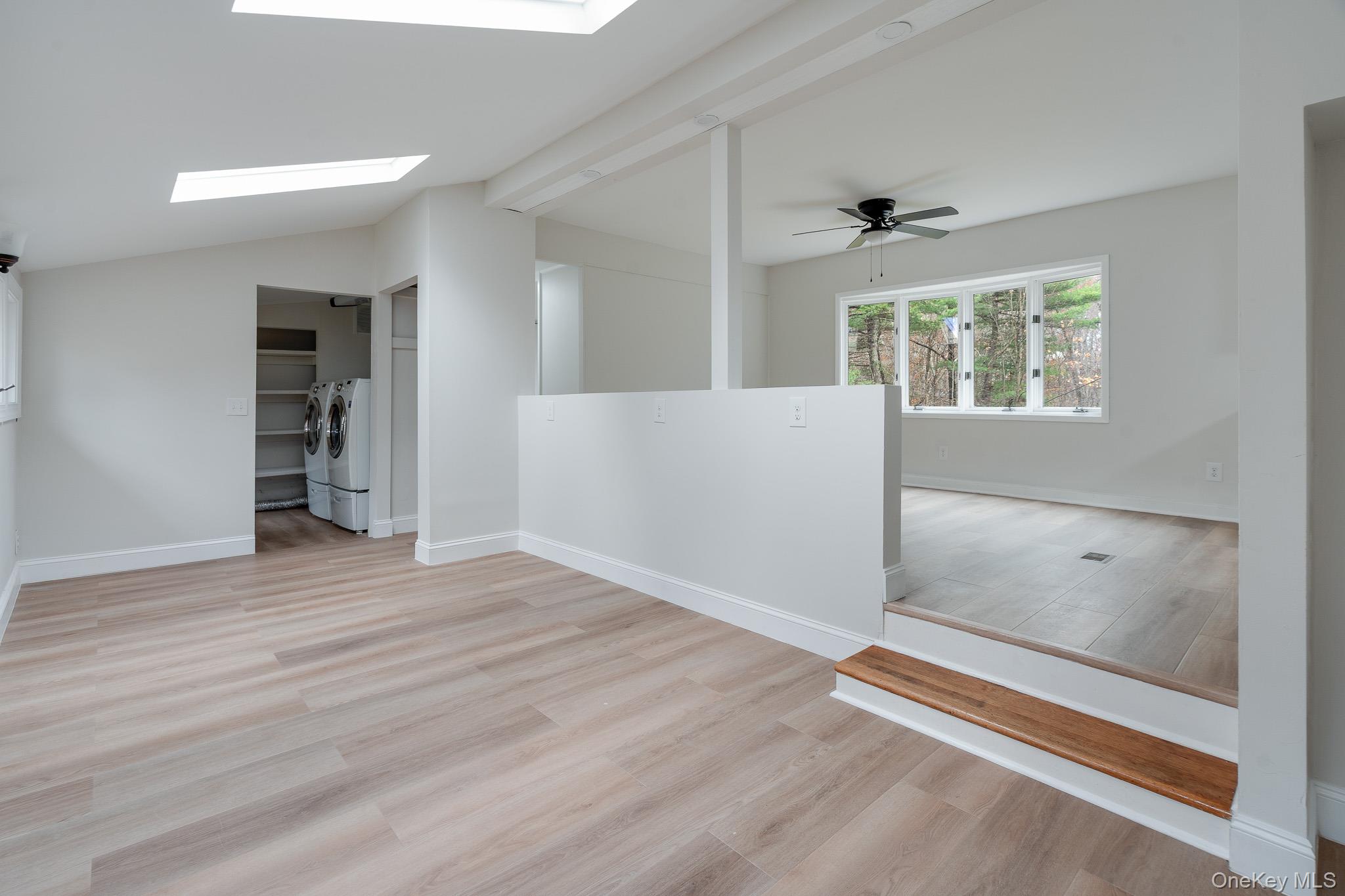 356 Sands Road Middletown, NY 10941 - Photo 5 of 22 an empty room with wooden floor and windows