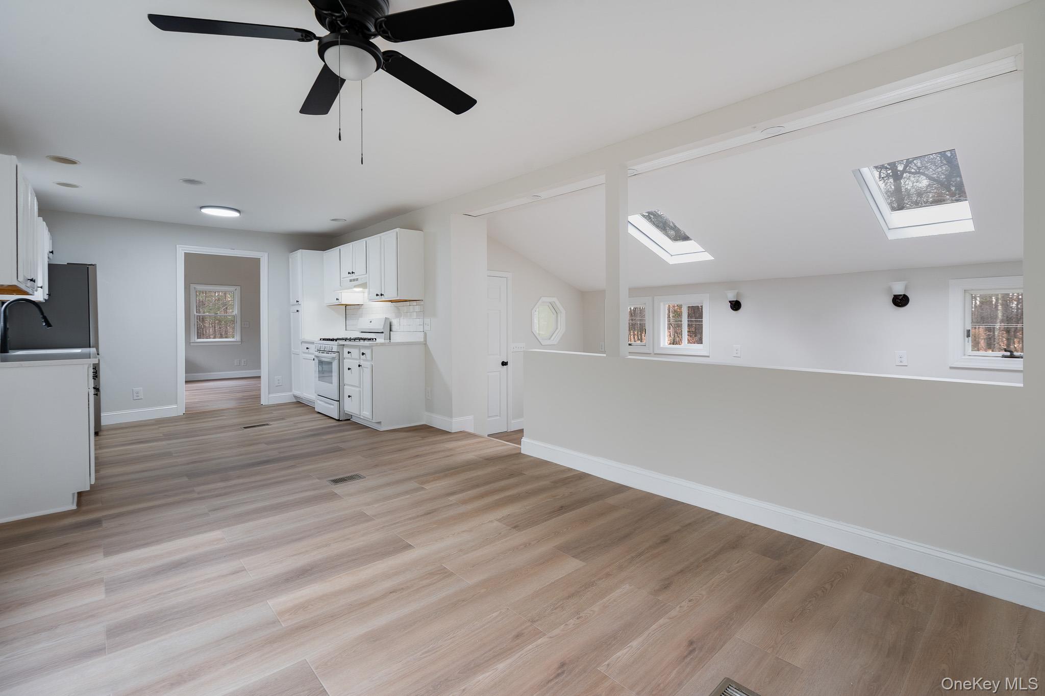 356 Sands Road Middletown, NY 10941 - Photo 6 of 22 a view of a kitchen with a dishwasher and a refrigerator