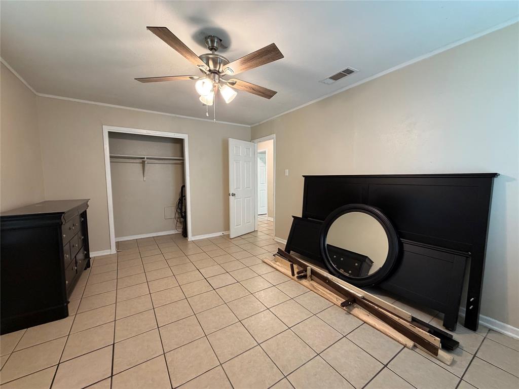 532 Northwest King Street Burleson, TX 76028 - Photo 15 of 17 a living room with a fireplace furniture and a ceiling fan