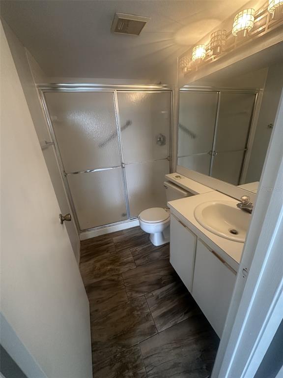 8215 Sun Spring Circle, Unit 63 Orlando, FL 32825 - Photo 11 of 22 a bathroom with a sink and toilet