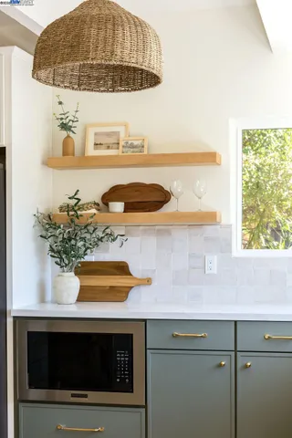 a kitchen with a sink and a window