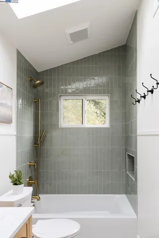 an aerial view of house with yard swimming pool and outdoor seating