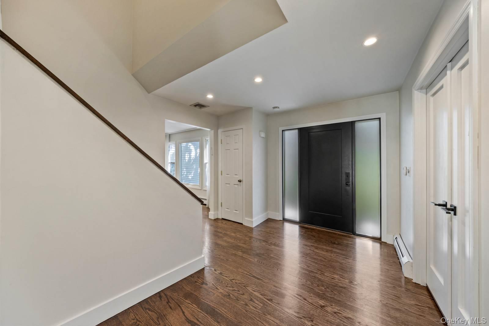 10 Demarest Road Spring Valley, NY 10977 - Photo 6 of 39 a view of a hallway with wooden floor